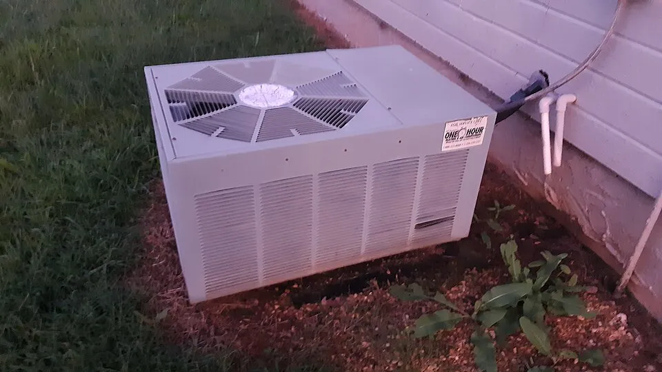 HVAC contractor working in a residential home